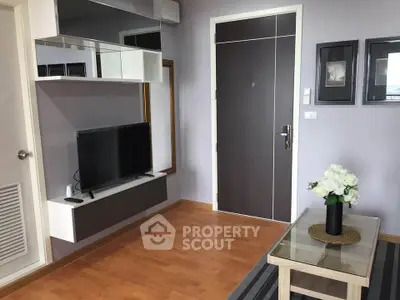 Modern living room with sleek TV unit and stylish decor