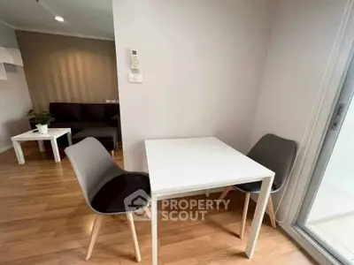 Modern apartment interior with cozy dining area and stylish furniture