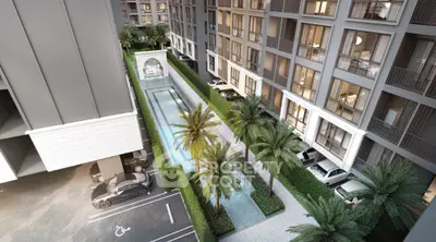 Luxurious apartment complex with pool and palm trees, offering modern urban living.