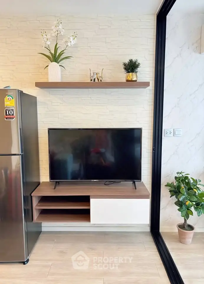 Modern living room with sleek TV setup and stylish decor