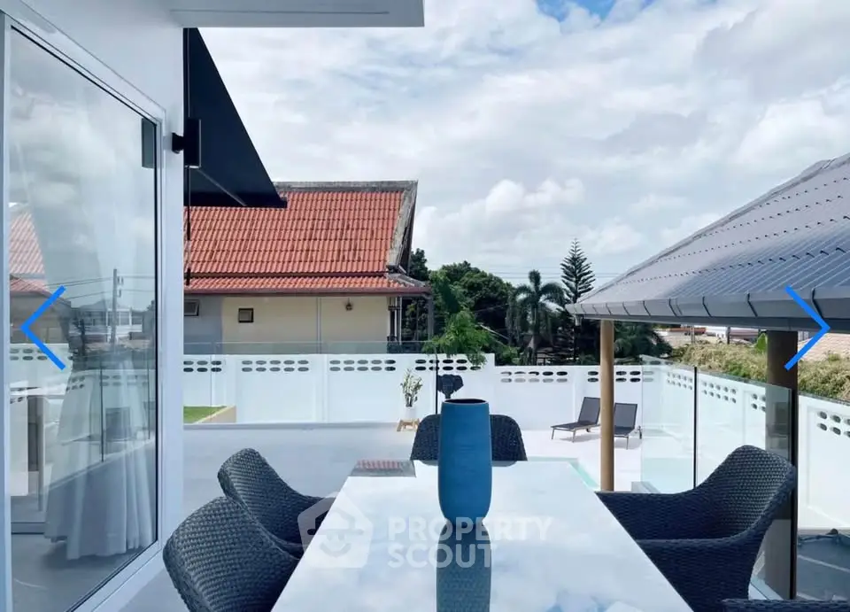 Stunning rooftop terrace with modern outdoor furniture and scenic views