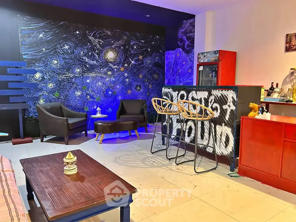Stylish living room with unique wall art and modern furniture