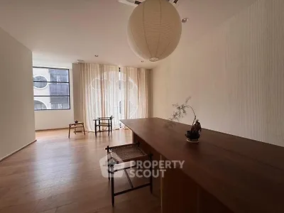 Minimalist living room with wooden floors and modern decor