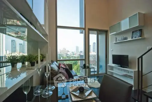Modern living room with city view and stylish decor