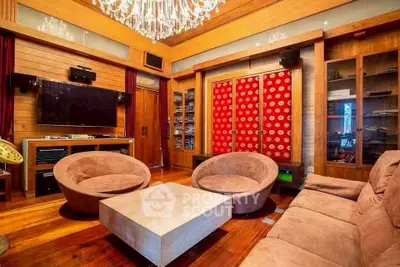 Luxurious living room with elegant chandelier and modern furniture
