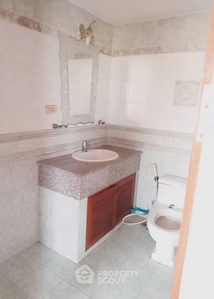 Spacious bathroom with elegant vanity and modern fixtures