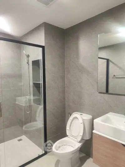 Modern bathroom with sleek shower and contemporary fixtures