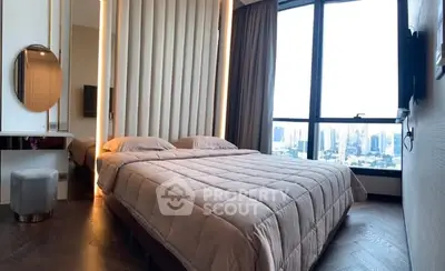 Luxurious bedroom with panoramic city view and elegant decor