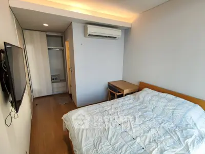 Modern bedroom with air conditioning and cozy decor
