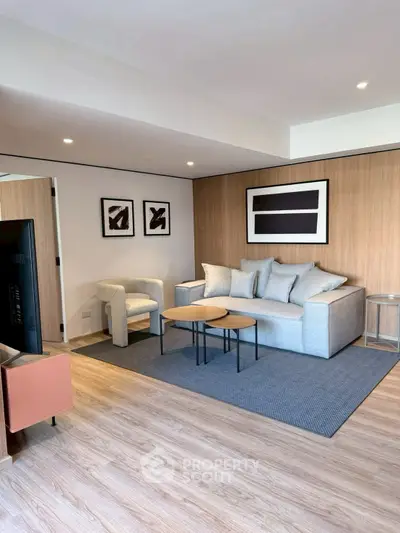 Modern living room with stylish furniture and wooden accents