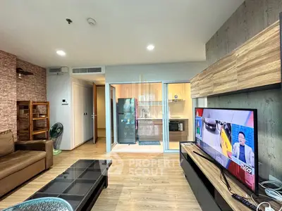 Modern living room with open kitchen and stylish decor