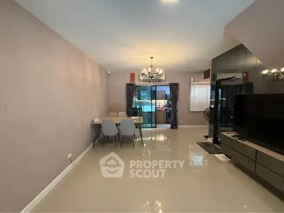 Spacious modern living room with elegant dining area and stylish decor