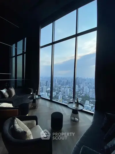 Luxurious living room with panoramic city view and elegant furnishings