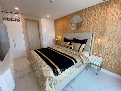 Luxurious bedroom with elegant gold accents and modern decor