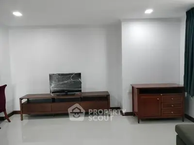 Spacious living room with modern furniture and sleek design