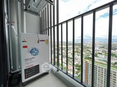 High-rise balcony with washing machine and stunning city view