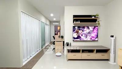 Modern living room with sleek TV unit and stylish decor