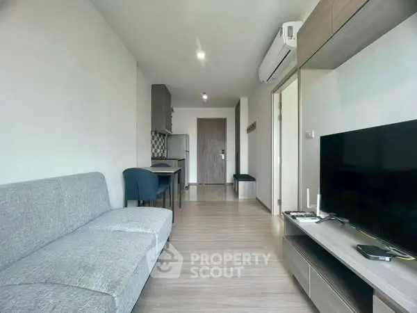 Modern living room with sleek furniture and open layout