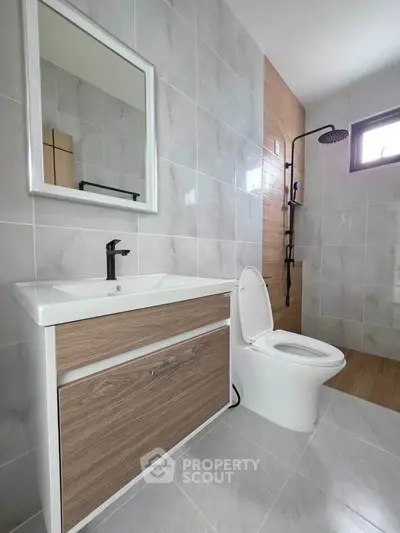 Modern bathroom with sleek fixtures and elegant tile design