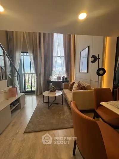Luxurious high-rise living room with floor-to-ceiling windows and elegant decor.