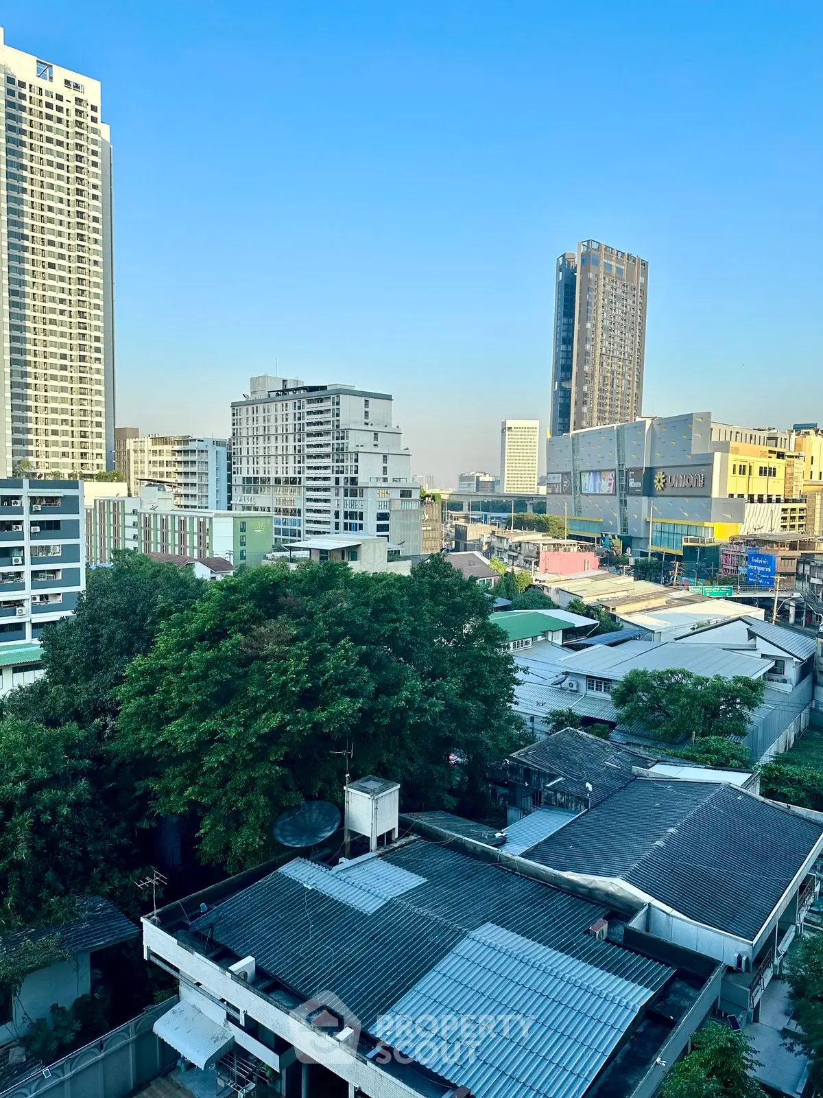 Stunning cityscape view from a high-rise building showcasing urban living.