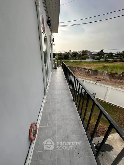 Spacious balcony with scenic view in modern residential building