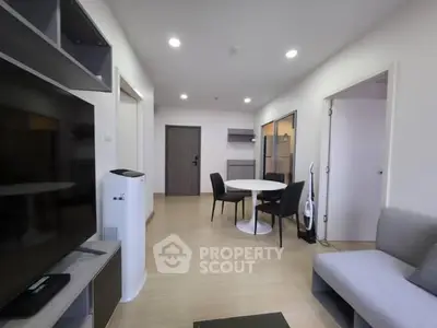 Modern living room with sleek furniture and open layout