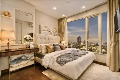Luxurious bedroom with stunning city view, elegant decor, and cozy ambiance for ultimate relaxation.