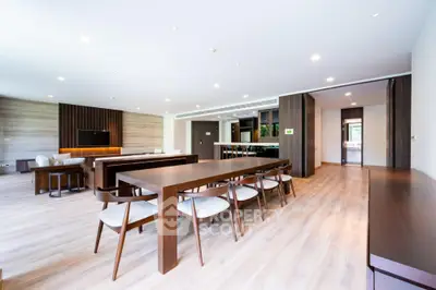 Spacious modern living room with elegant wooden furniture and open layout design