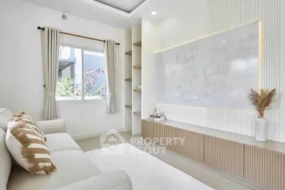 Modern living room with elegant decor and natural light