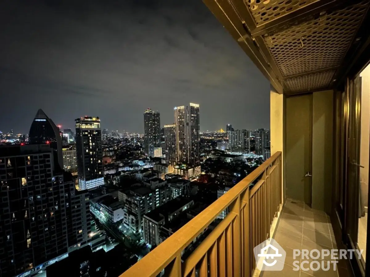 Stunning city skyline view from modern high-rise balcony at night