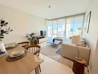 Spacious modern living room with city view and elegant decor