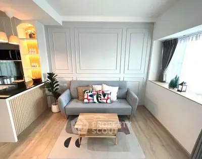 Modern living room with stylish decor and natural light