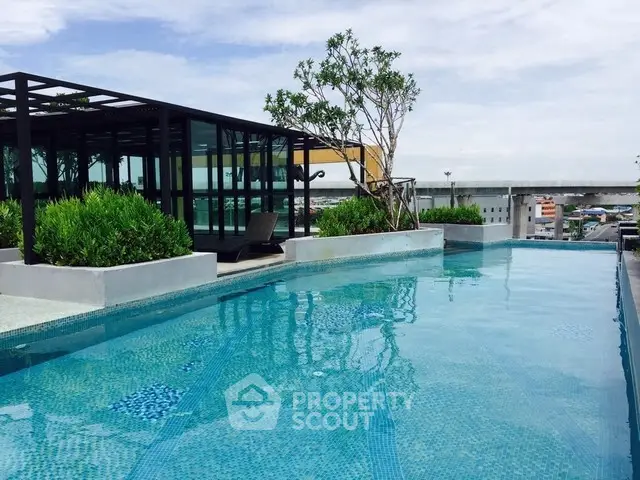 Luxurious rooftop pool with stunning city views and modern design.