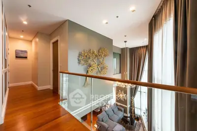 Luxurious modern living room with high ceilings and elegant decor