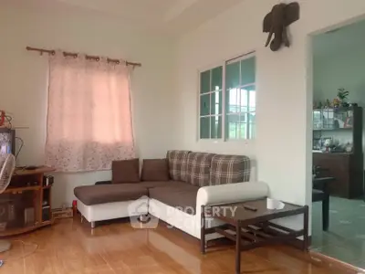 Cozy living room with modern sectional sofa and natural light