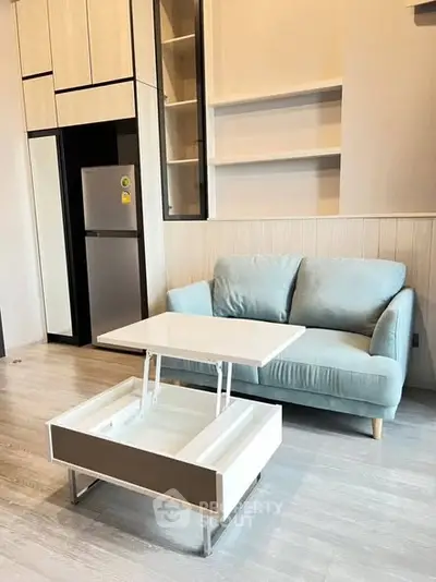 Modern living room with stylish sofa and multifunctional coffee table