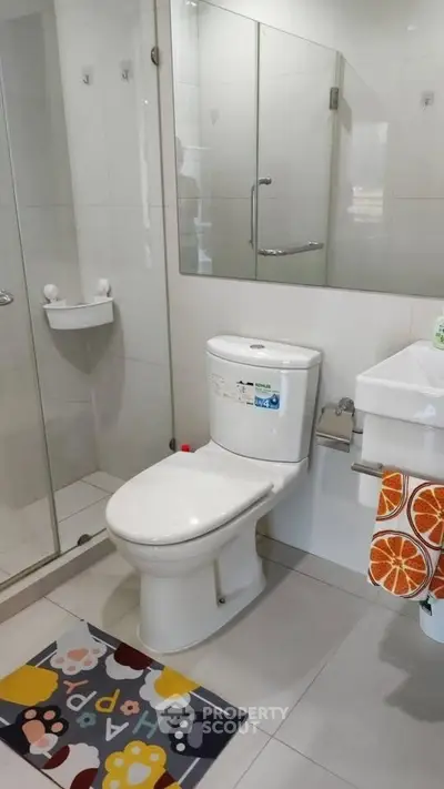 Modern bathroom with glass shower and stylish decor