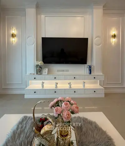 Elegant living room with modern TV setup and stylish decor