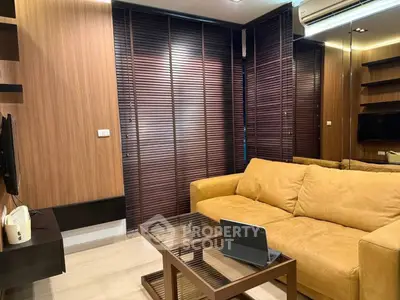 Modern living room with cozy sofa and sleek wooden blinds