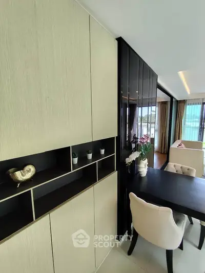 Modern living room with elegant dining area and stylish decor