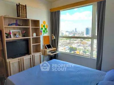 Cozy bedroom with city view and modern decor in high-rise apartment