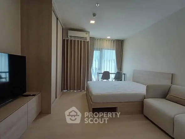 Modern bedroom with minimalist design and natural light