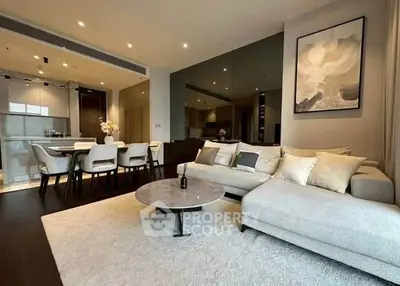 Luxurious modern living room with elegant dining area and stylish decor