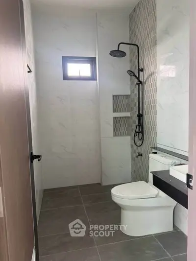 Modern bathroom with sleek fixtures and stylish tile design