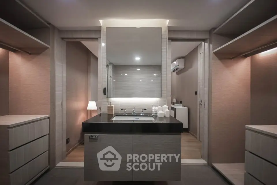 Luxurious modern bathroom with sleek vanity and ambient lighting