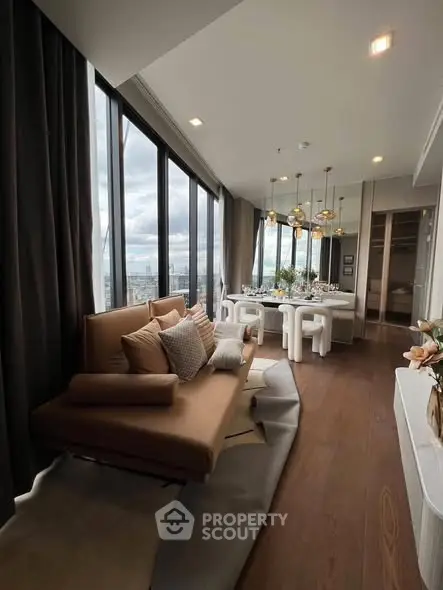 Luxurious modern living room with panoramic city views and elegant dining area.