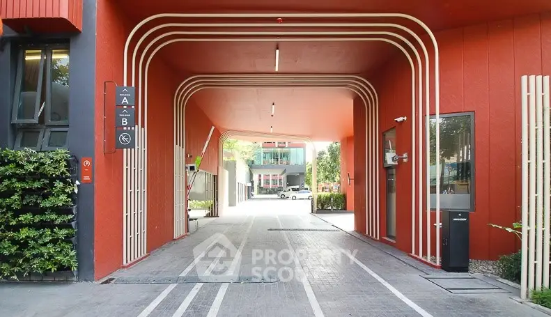 Modern building entrance with unique architectural design and vibrant colors