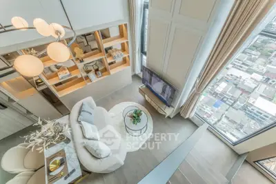 Luxurious high-rise living room with panoramic city view and elegant decor