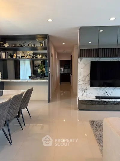 Modern living room with elegant dining area and stylish decor